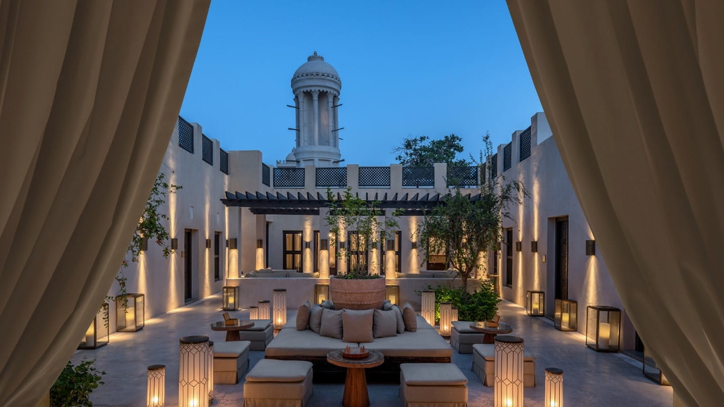 The courtyard of Al Bait in Sharjah, lit at dusk